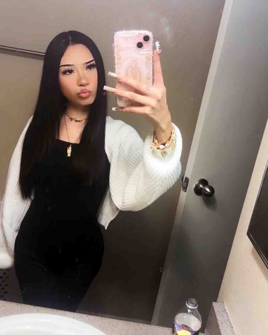 A full-body view of Vivi2freaky showcasing her 5'5" height and modern alternative fashion style.