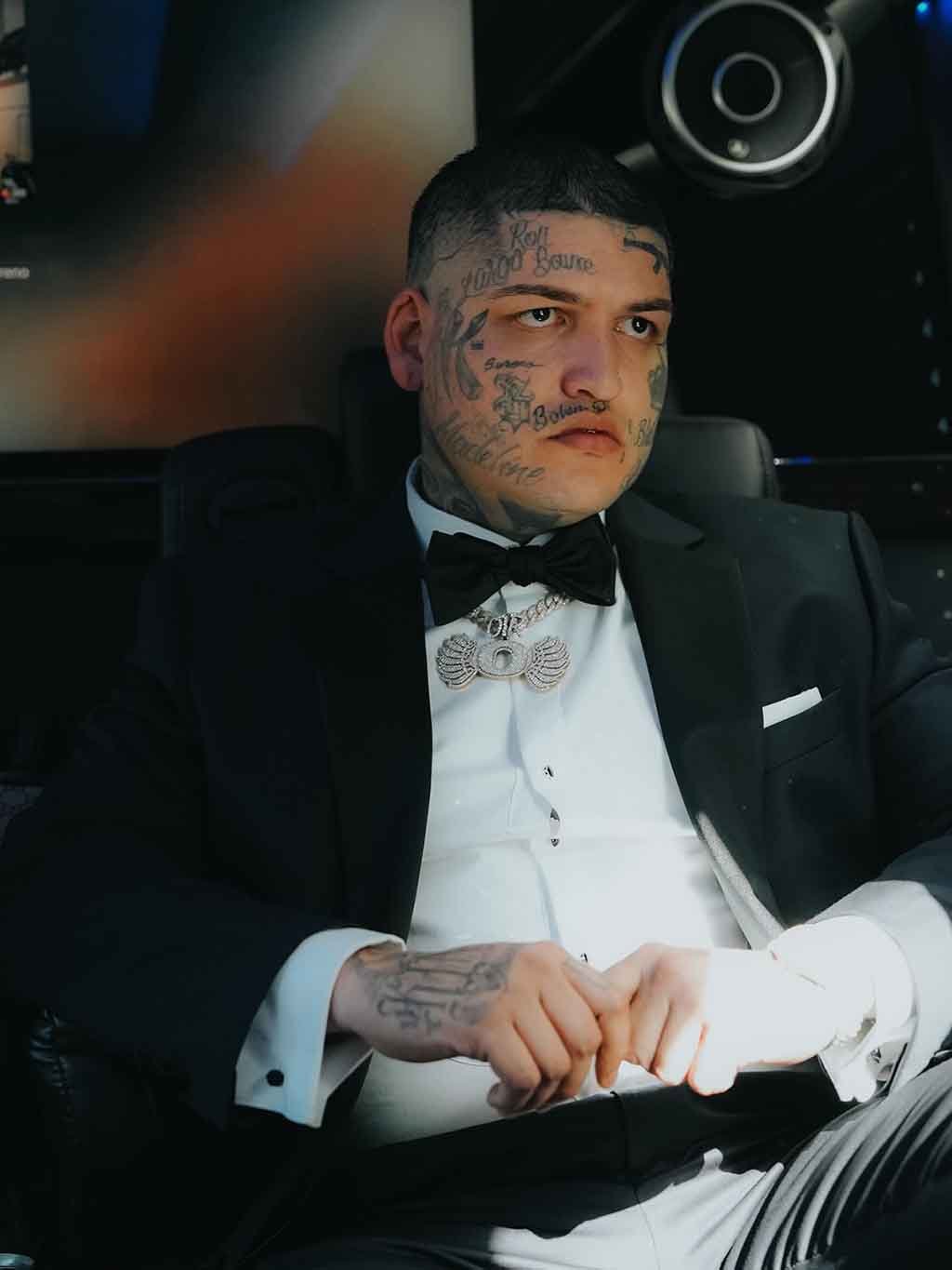 Lefty Gunplay Family and Personal Life 2026, Lefty Gunplay, Lefty Gunplay family, Lefty Gunplay son, Lefty Gunplay daughter, personal life, family story, fatherhood, transformation, suit